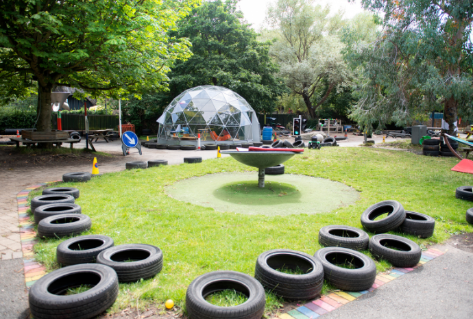 The Yard Edinburgh outdoors, view of grass area and solar dome