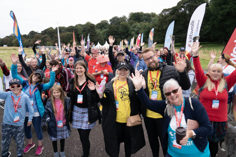 Walkers at the Edinburgh kiltwalk wearing yard t-shirts