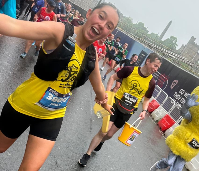 Fundraisers wearing yellow yard t-shirts are running in the EMF