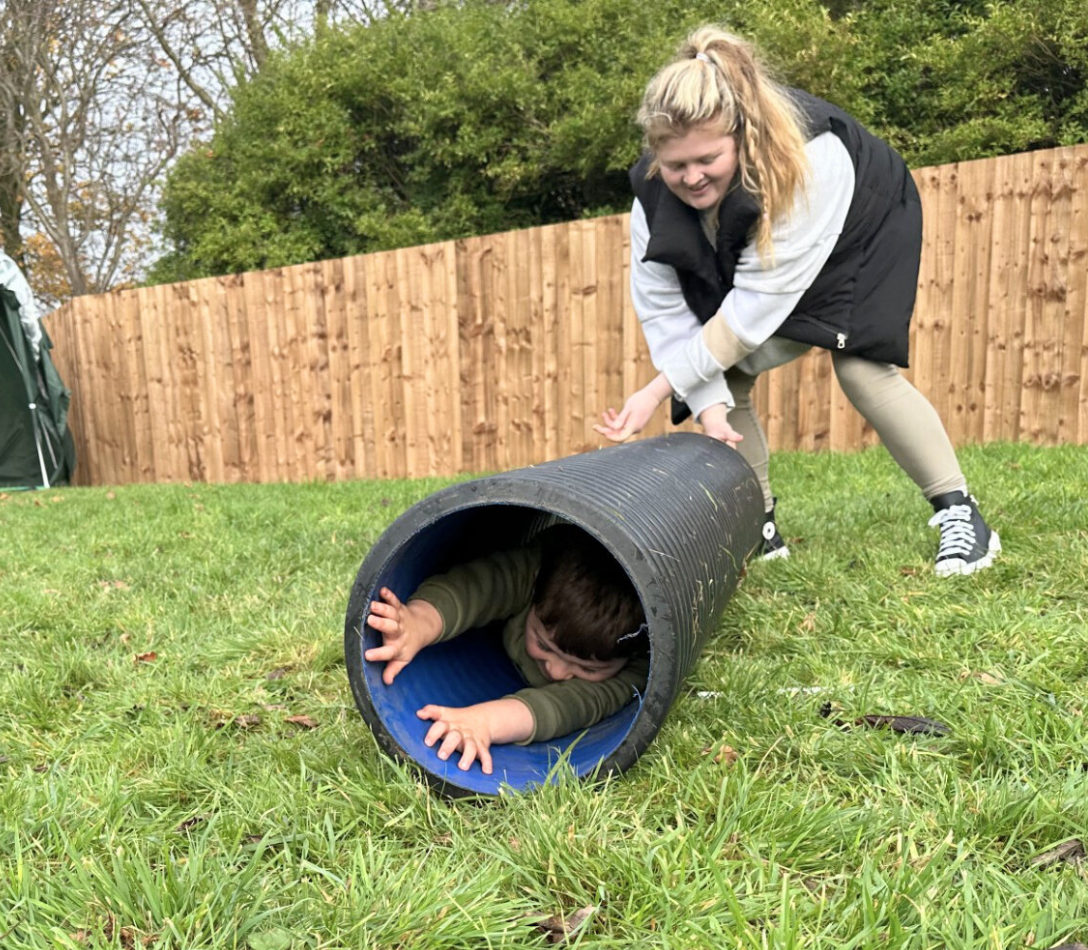 Mum, Ashley playing with her son Mylo at The Yard